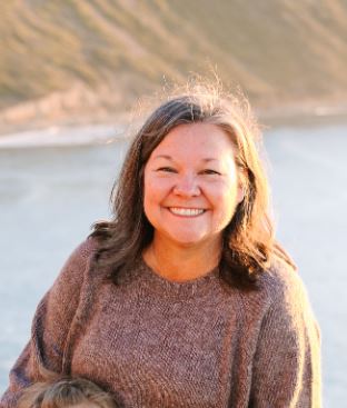 Headshot of Kelly Ann Sassonne.