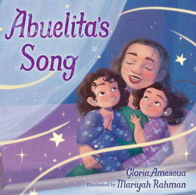 A woman sings with her eyes closed and two smiling children in her lap